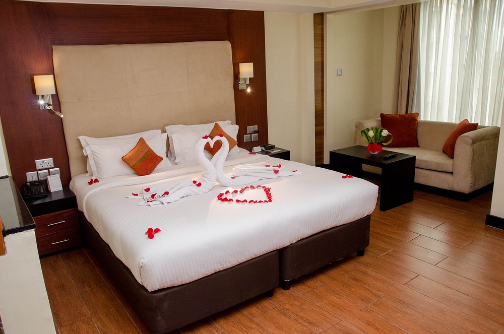 Queen Room interior showing a plush queen bed